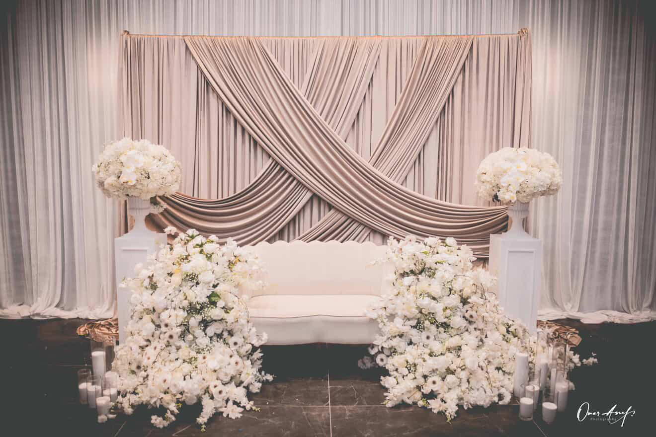 Luxury gold tablescape with floral centerpiece by Lavish Decor