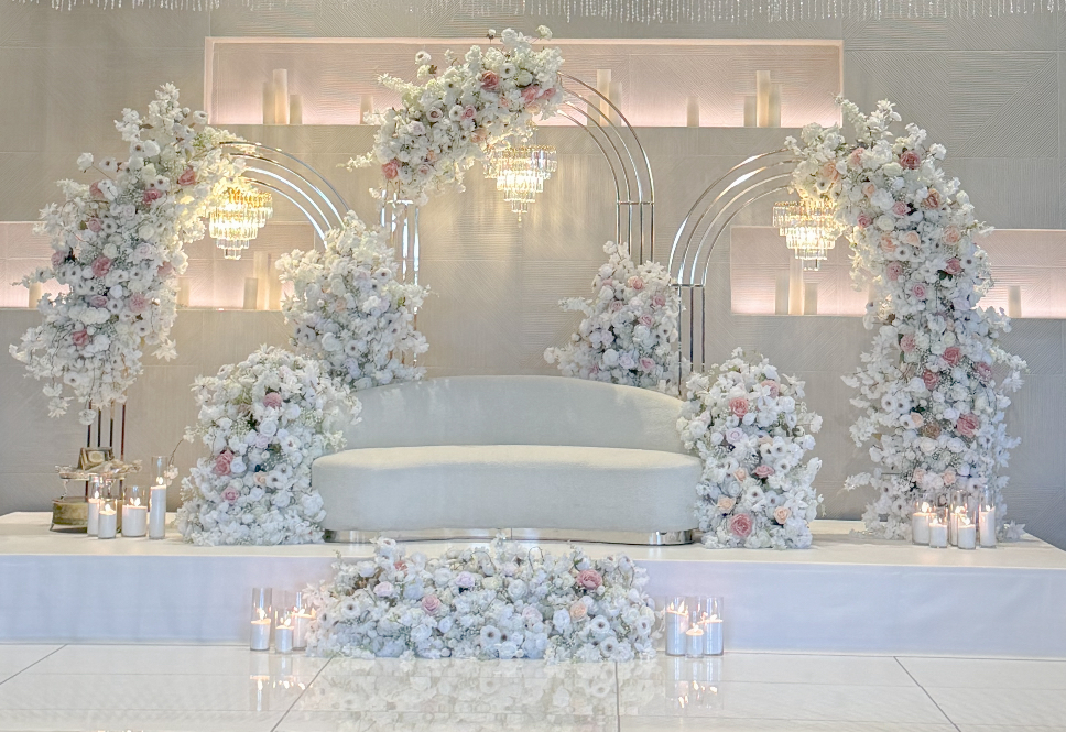 Luxury blush draping with crystal chandeliers