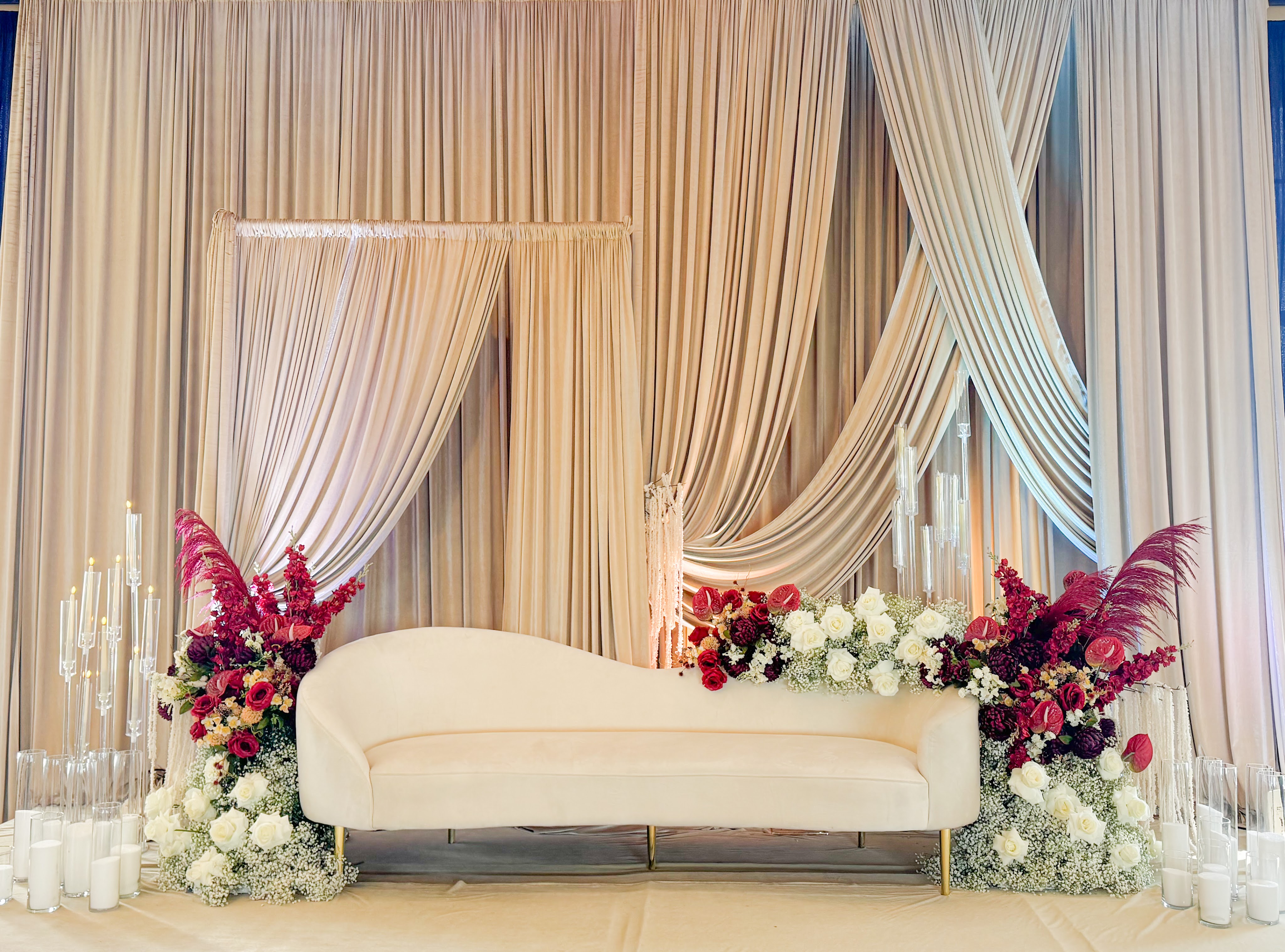 Elegant outdoor celebration with balloon arch